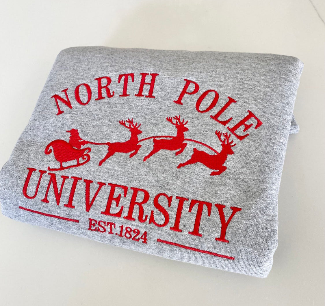 North Pole University Christmas Embroidered Sweatshirt