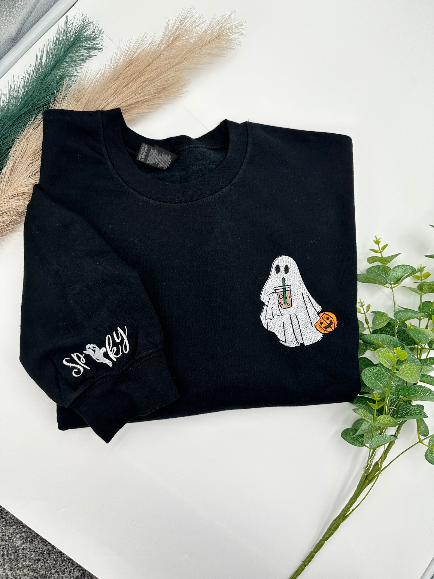 Embroidered Halloween Ghost jumper with spooky on the left sleeve