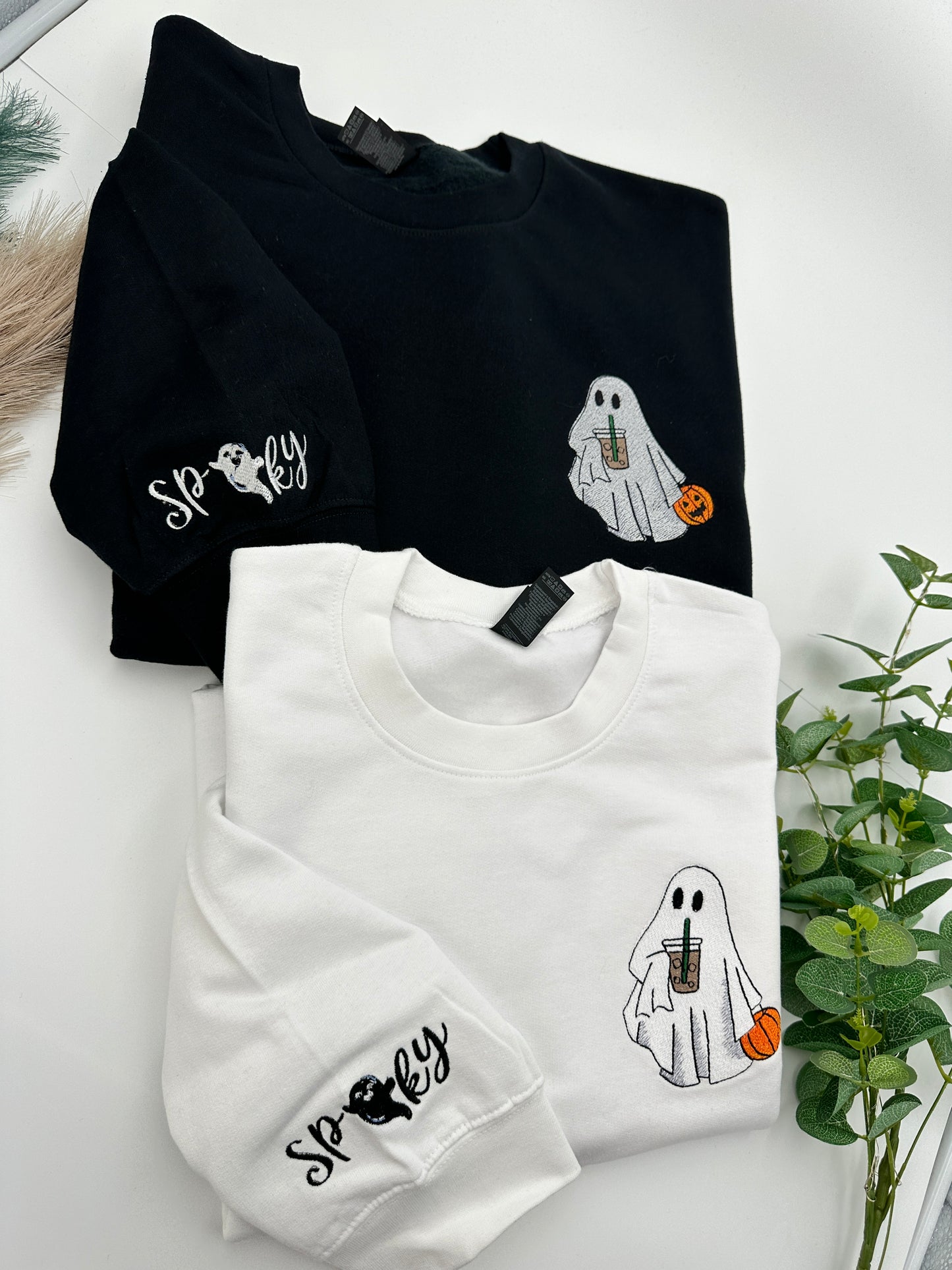 Embroidered Halloween Ghost jumper with spooky on the left sleeve