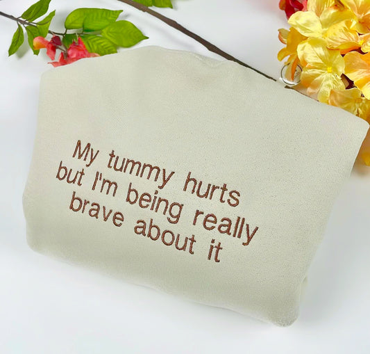My Tummy Hurts But Im Being Really Brave About It Embroidered Sweatshirt